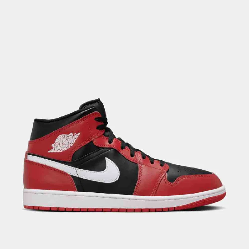 Men's basketball shoes with a herringbone outsole pattern for superior tractionAir Jordan 1 Mid