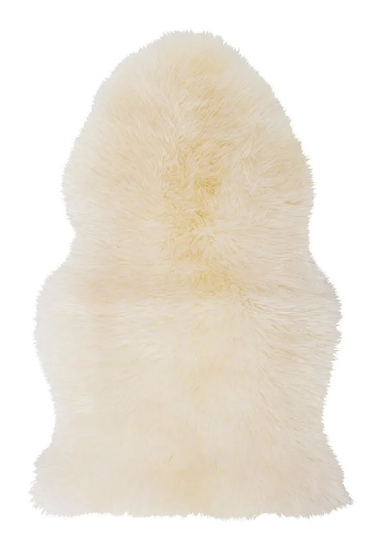 Men's slippers with a decorative pom - pom or tasselNATURAL SHEEPSKIN RUG COLOUR WHITE