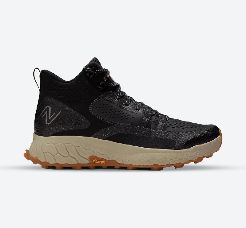 Men's hiking boots with a gusseted tongue to keep out debrisMen's Wide Fit New Balance MTHIMCBB Walking Trainers - Boots